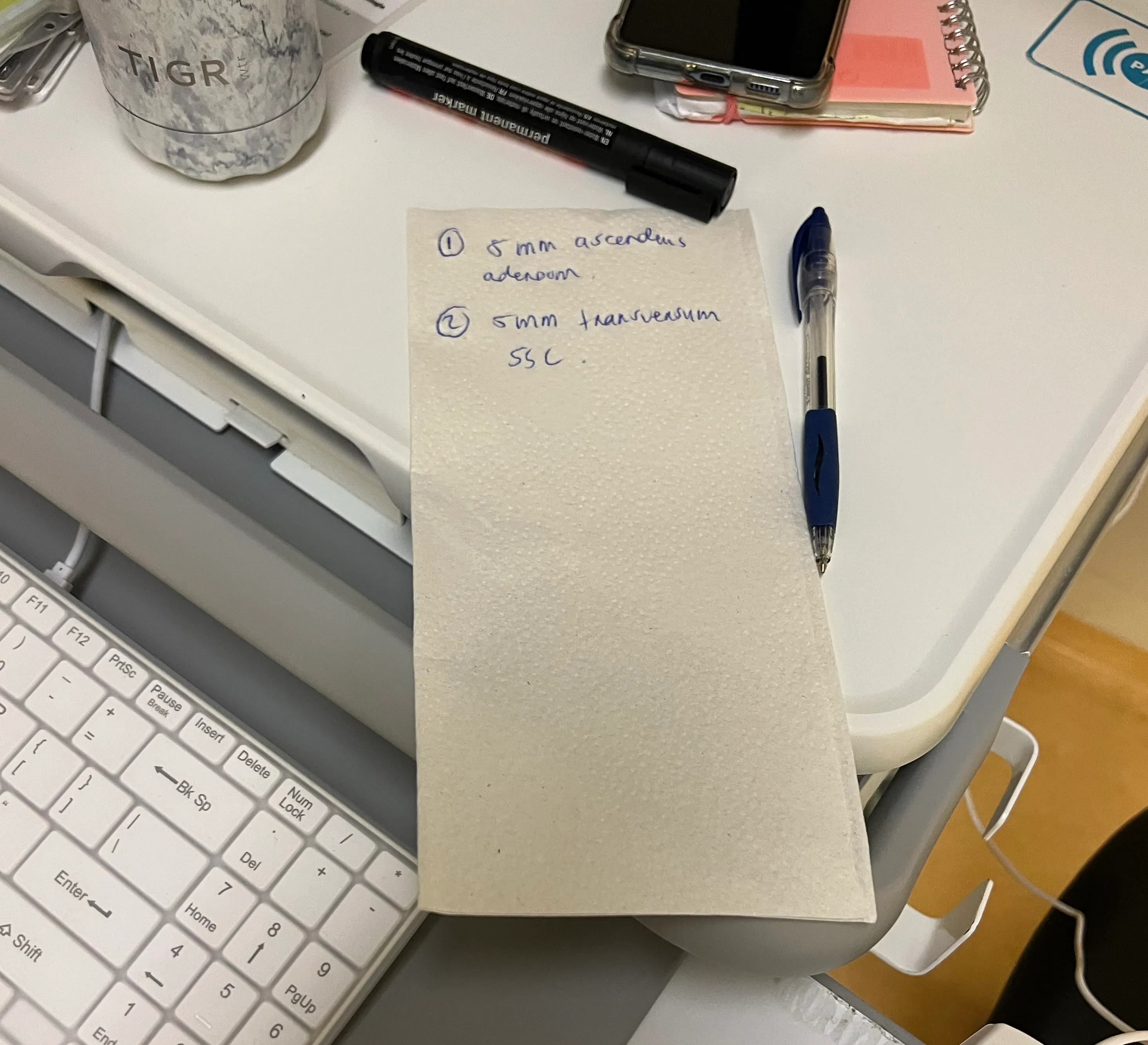 Resection details written on a piece of scrap paper